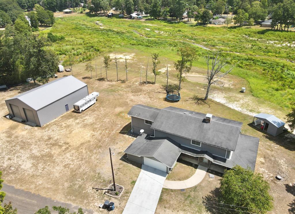 Secluded Paradise Awaits You in Tyler, TX! Over 0.25 Acres of Nature's Beauty!