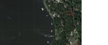 Serene Lakefront Property with Boat Dock Access - Unbeatable Investment Opportunity!