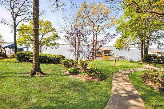 Serene Lakefront Property with Boat Dock Access - Unbeatable Investment Opportunity!